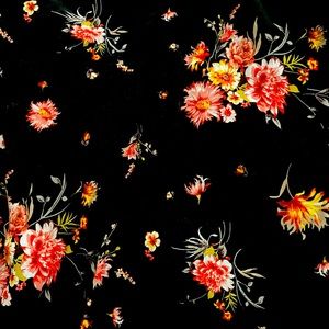 Torrid floral black knee length skirt with fluff 3/4 size